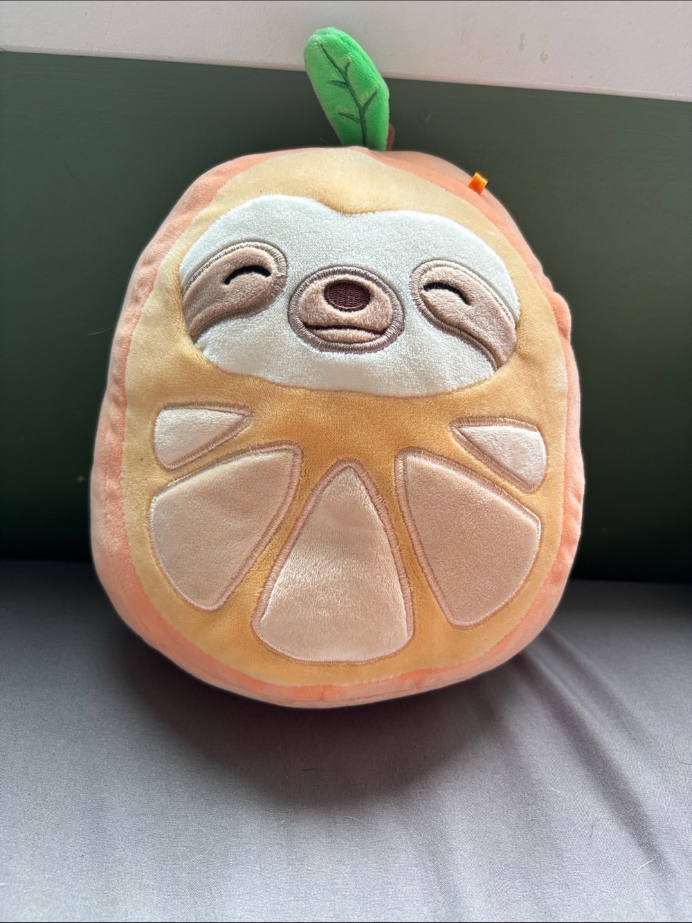 Simón in an Orange Costume squishmallow